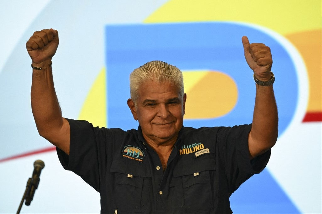 Panama's president-elect Jose Raul Mulino celebrates with ers after winning Panama's presidential election in Panama City on May 5, 2024. Jose Raul Mulino, the protege of a graft-convicted former head of state, was declared Panama's president-elect after elections Sunday. Mulino, 64, won the single-round, first-past-the-post race with more than a third of votes cast, the Central American country's electoral tribunal said. (Photo by MARTIN BERNETTI / AFP)